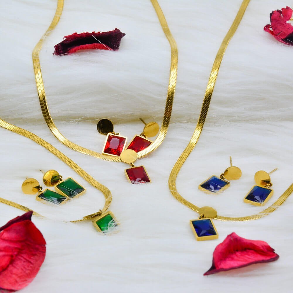 طقم بعقد بشكل افعى واقراط من الفولاذ المقاوم للصدأ العالي الجودة بضمان 8 سنوات Acier Inoxydable